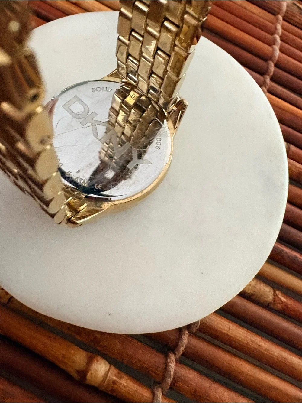DKNY Gold Tone Crystal Bezel Watch with Mother-of-Pearl Dial Needs Battery